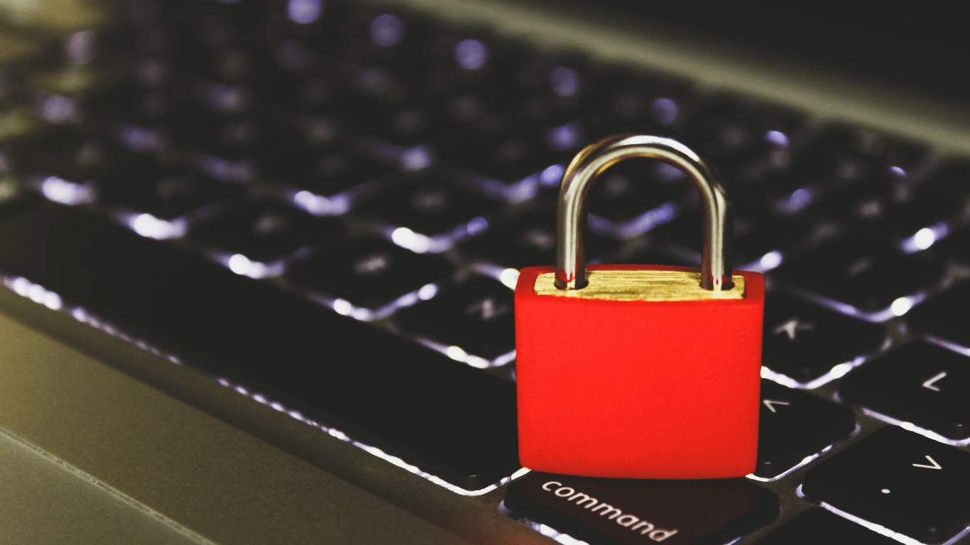 a padlock on top of a laptop computer