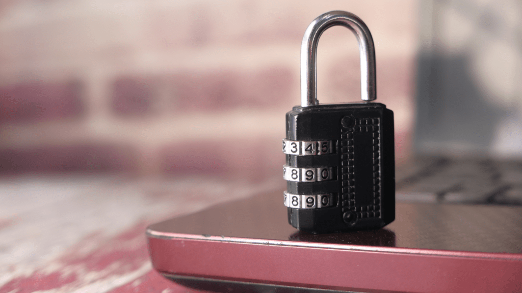 a padlock on top of a laptop computer