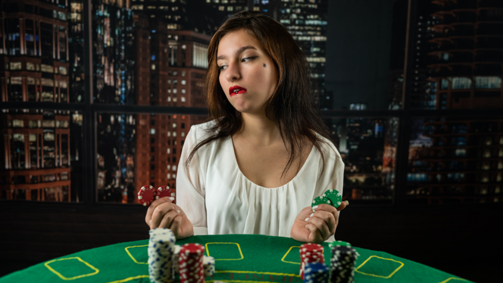 a person playing poker at the casino